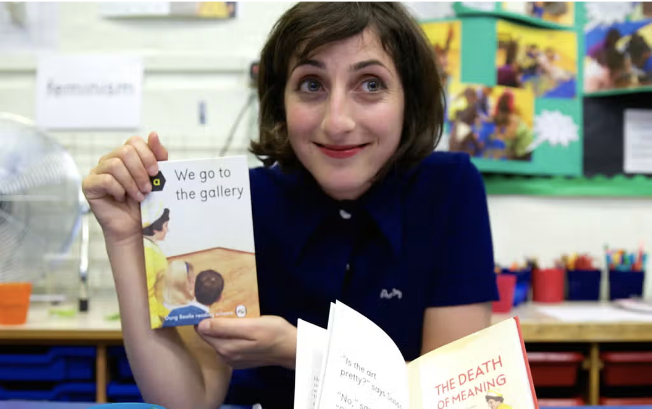 Author Miriam Elia holds her book We Go To The Gallery