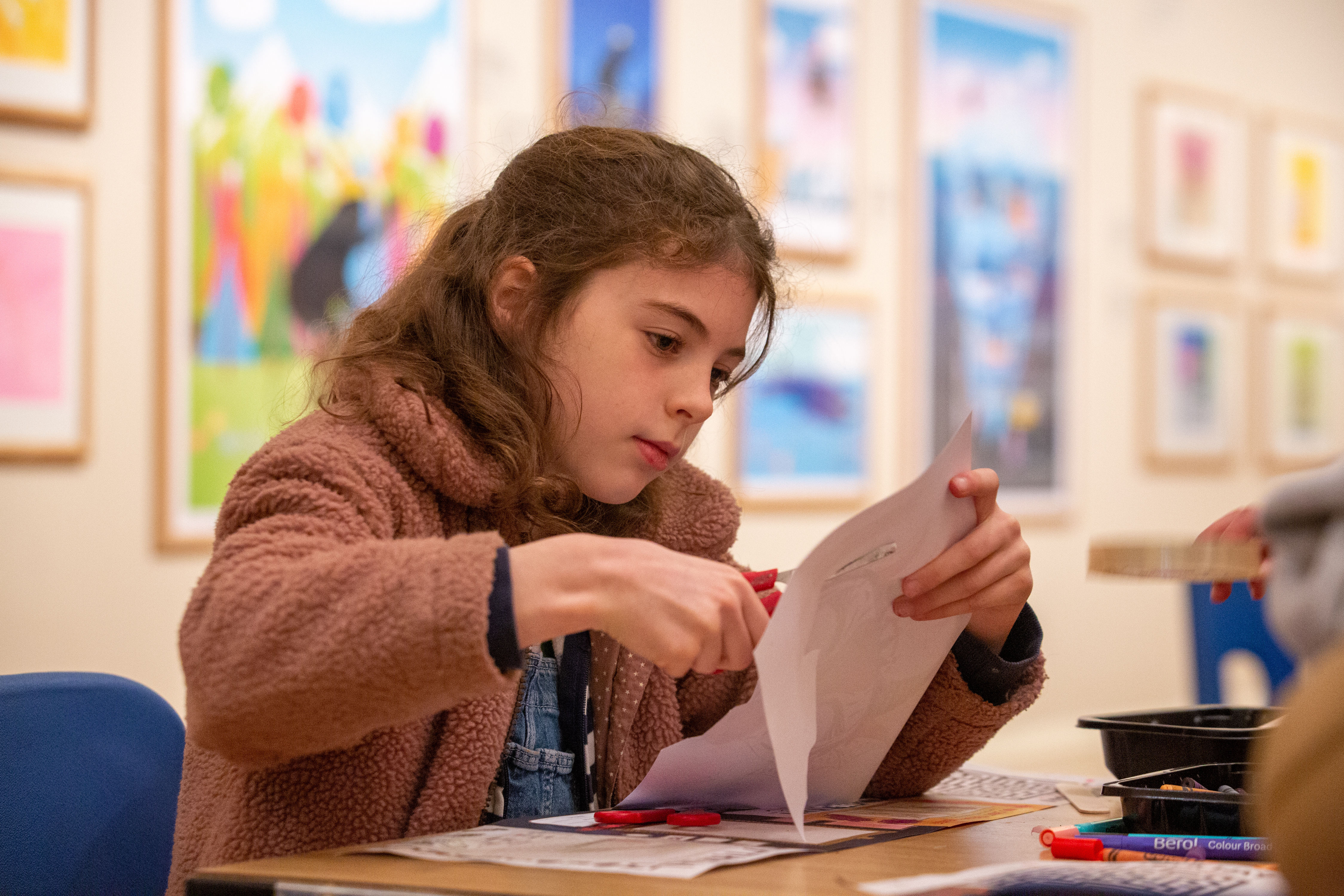 A girl doing arts and craft