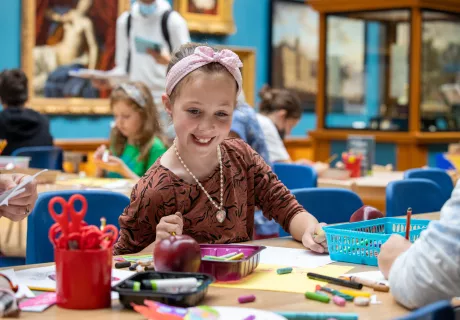 Girl doing craft activities in the Victoria Art Gallery