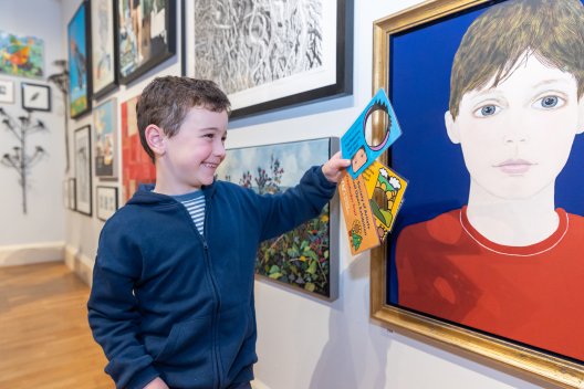 A young boy enjoying the I Spy trail